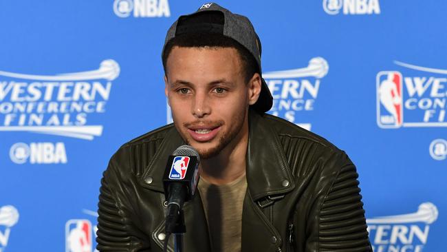 Stephen Curry of the Golden State Warriors speaks to members of the media following their 96-88 win over the Oklahoma City Thunder.