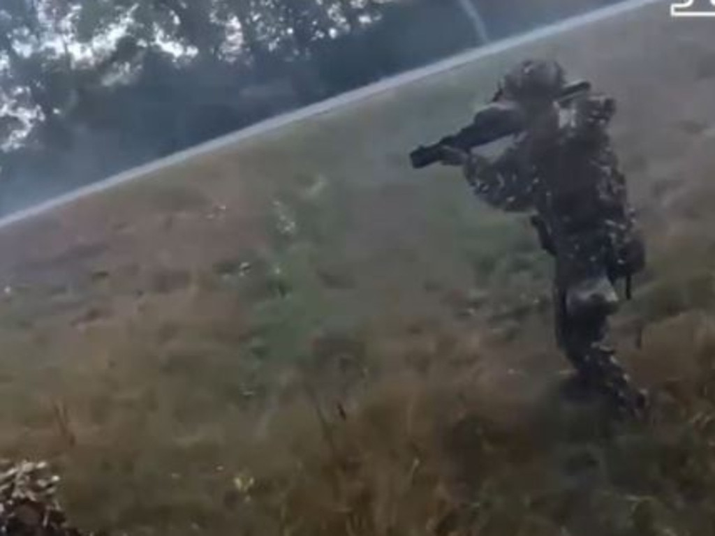 Ukrainian soldiers advance. Picture: Supplied