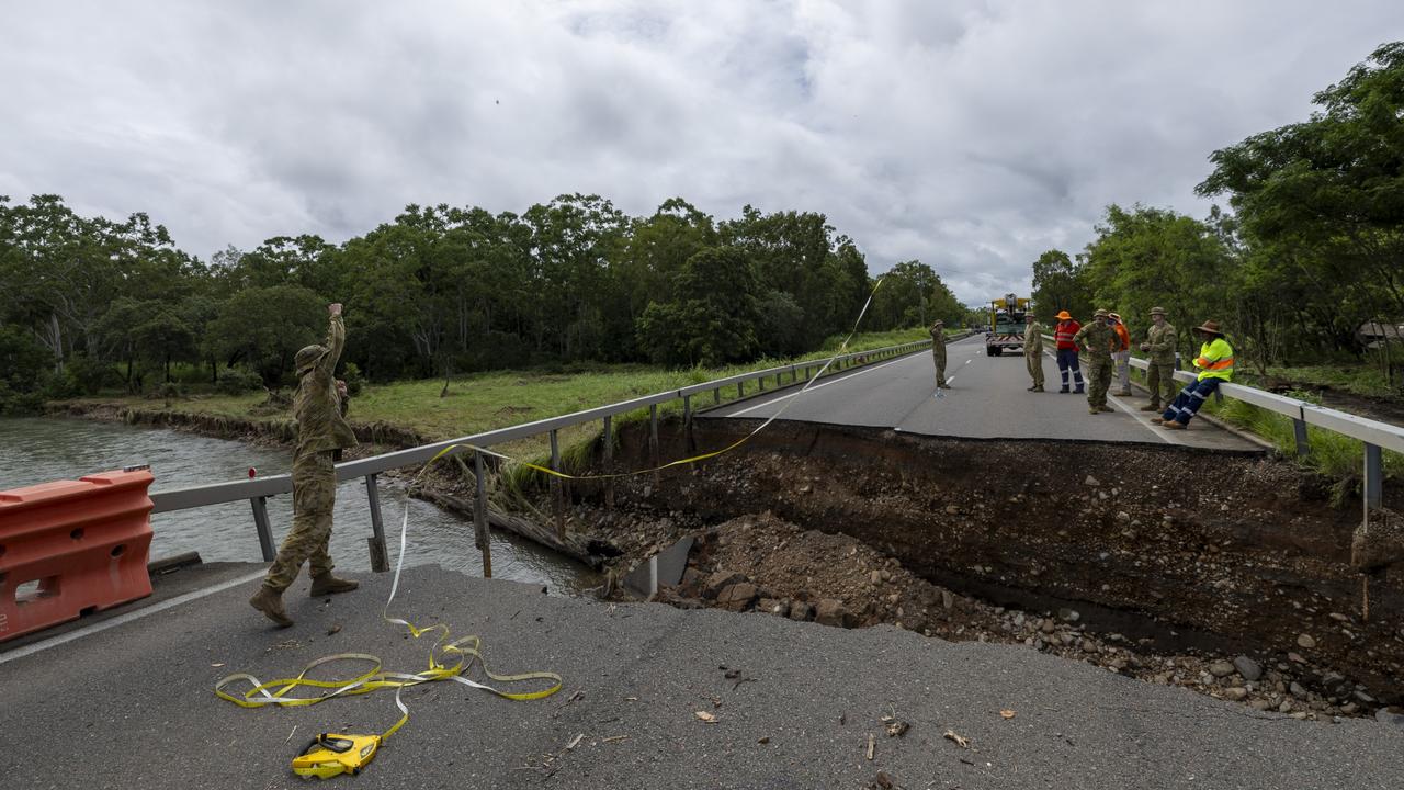 Australian Army soldiers were able to put in a temporary bridge after the severely flood-damaged Ollera Creek Bridge cut off flood-affected communities.