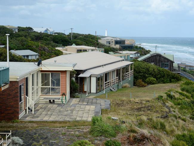 Ronald Mulkearns’ Aireys Inlet house (orange timber weatherboard). Picture: Jake Nowakowski