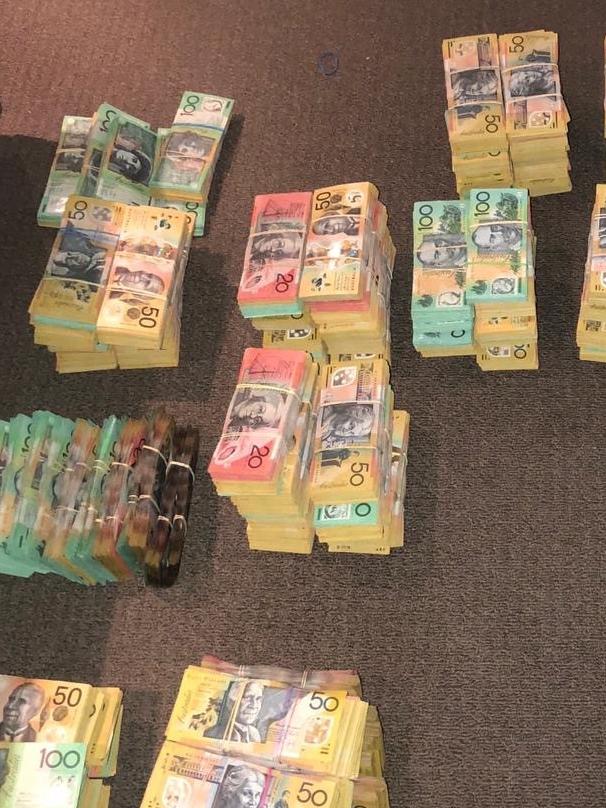 Australian Federal Police seized $1.8 million from a cash-collector's home in Melbourne in July 2019. Picture: AFP