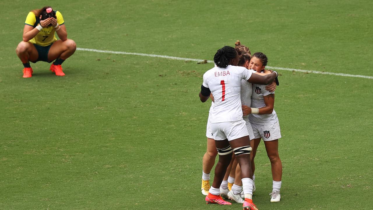 USA players celebrate the win as Charlotte Caslick struggles to hide her disappointment. Picture: Getty Images