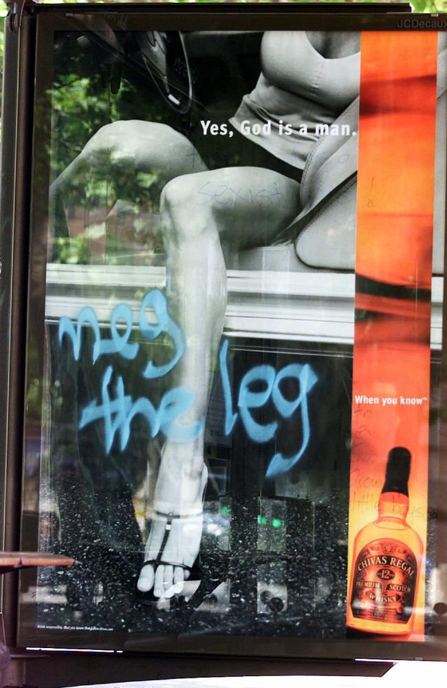 A Chivas Regal poster featuring model Brooke Burns was defaced by protesters alleging the advertisement as sexist at a bus stop outside the UTS Tower in Sydney in 2000. Picture: Linsday Moller