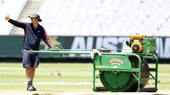 M.C.G. curator Matt Page works on the wicket during an Australian test squad training session at Melbourne Cricket Ground on December 23, 2022 in Melbourne, Australia. (Photo by Darrian Traynor/Getty Images)