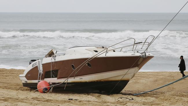 The speedboat belonging to Quiksilver CEO Pierre Agnes lays ashore on the beach of Hossegor, southwestern France.