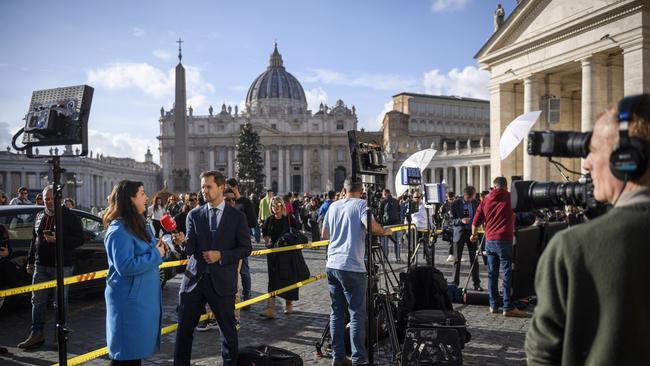 Media gather at St Peter's Square after the announcement of the death of Benedict XVI. Picture: Getty Images