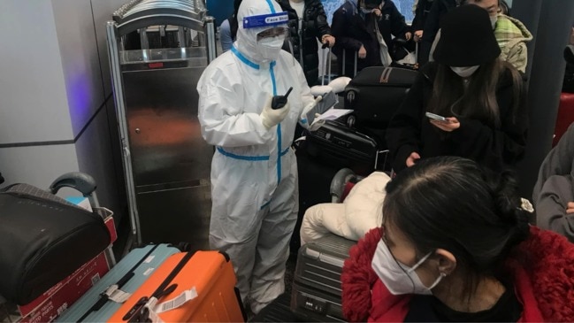 China loosens travel restrictions amid COVID-19 surge