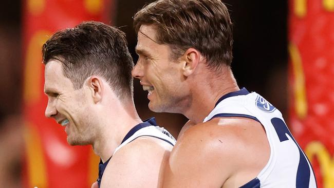 BRISBANE, AUSTRALIA - OCTOBER 10: Patrick Dangerfield of the Cats (left) and Tom Hawkins of the Cats celebrate during the 2020 AFL First Semi Final match between the Geelong Cats and the Collingwood Magpies at The Gabba on October 10, 2020 in Brisbane, Australia. (Photo by Michael Willson/AFL Photos via Getty Images)