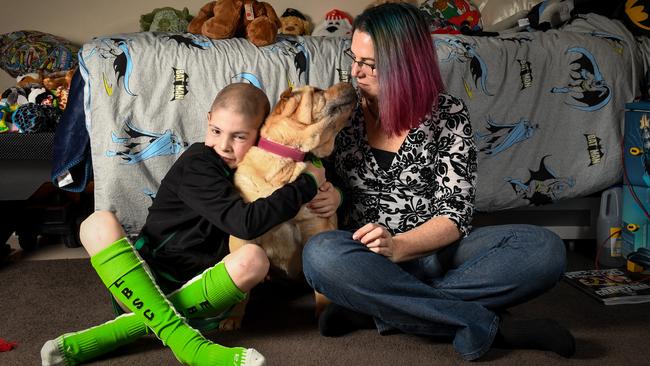 Riley Sinclair, dog Bonnie and mum Tammy Sinclair at their East Bentleigh home. Picture: Penny Stephens