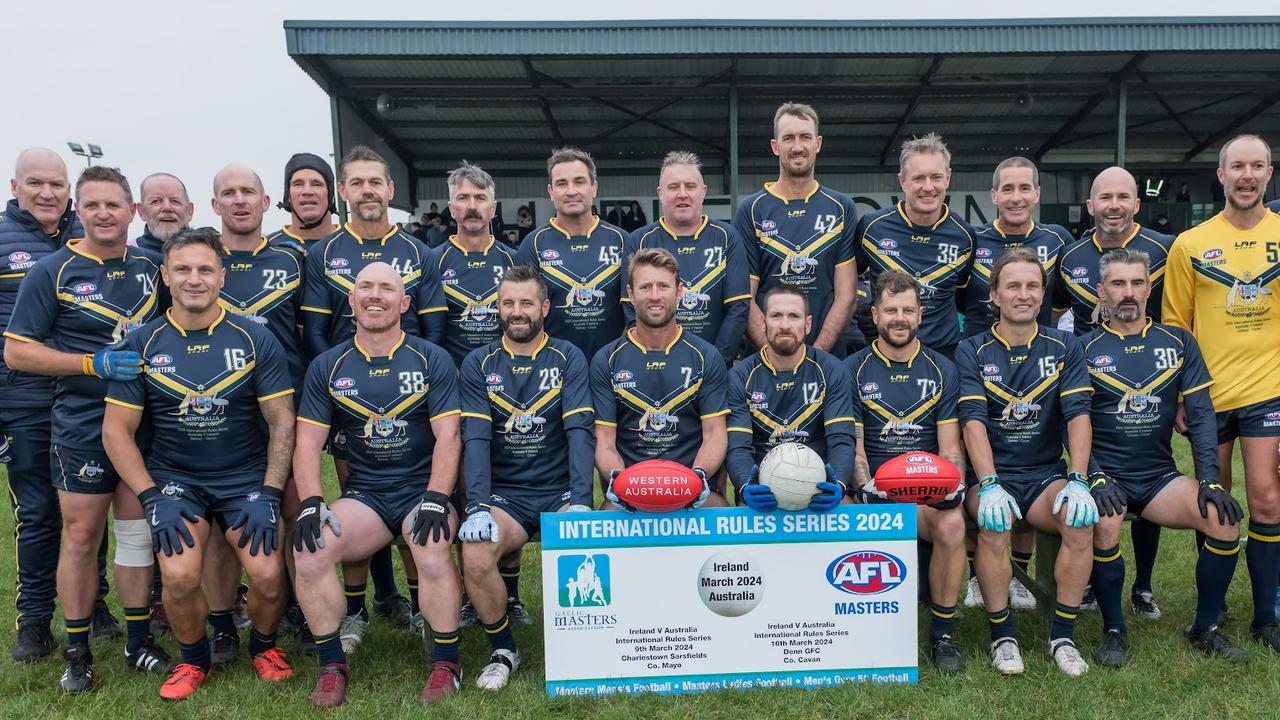 Adam Hunter (middle) with his Australian Masters over-40s men's team. Picture: Martin McIntyre.