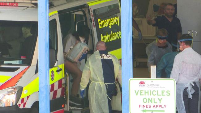 The 21-year-old yarrives at Sydney's Westead Hospital afer reurnig a positive swab for Coronavirus. Picture: TNV