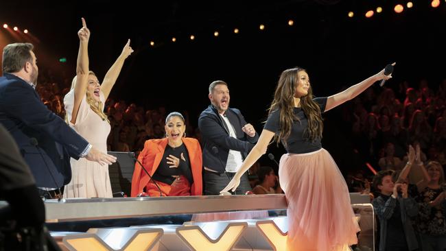 Australia's Got Talent host Ricki-Lee Coulter uses the golden buzzer. Pic: Channel 7