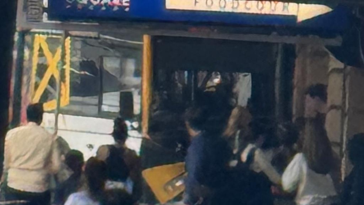 Stunned onlookers near the scene of the crash in Brisbane's CBD. Picture: Supplied /Sarah Wykes / Twitter