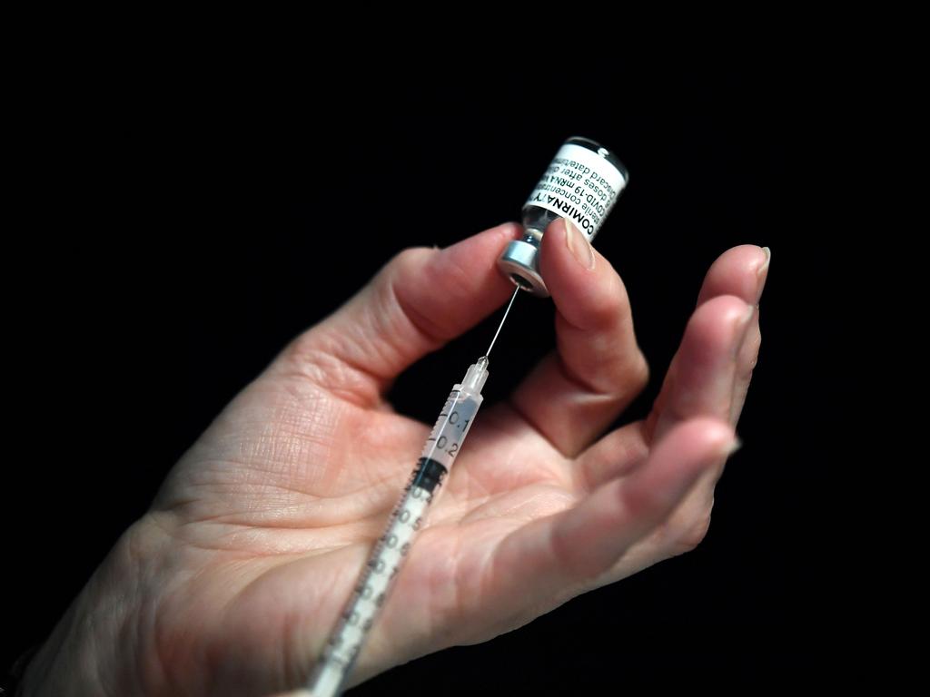 A nurse prepares a syringe of the Pfizer-BioNtech Covid-19 vaccine. Picture: AFP