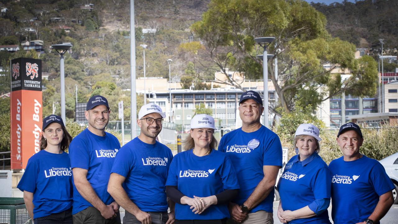 Liberal candidates for Clark Emma Atterbury, Jon Gourlay, Simon Behrakis MP, Madeleine Ogilvie MP, Mohammad Aldergham, Catherine Searle and Marcus Vermey outside the Sandy Bay UTAS campus during the 2024 state election campaign. Picture: Chris Kidd