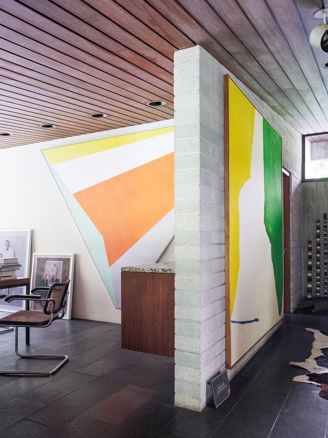 Painting by Kenneth Noland, <i>Mid-morning</i> (1976), in the dining room (partial view), painting by Helen Frankenthaler,<i>Hillside</i> (1971), in the entry foyer (left), and small sculpture on the floor by Agatha Gothe-Snape. Picture: Dave Wheeler