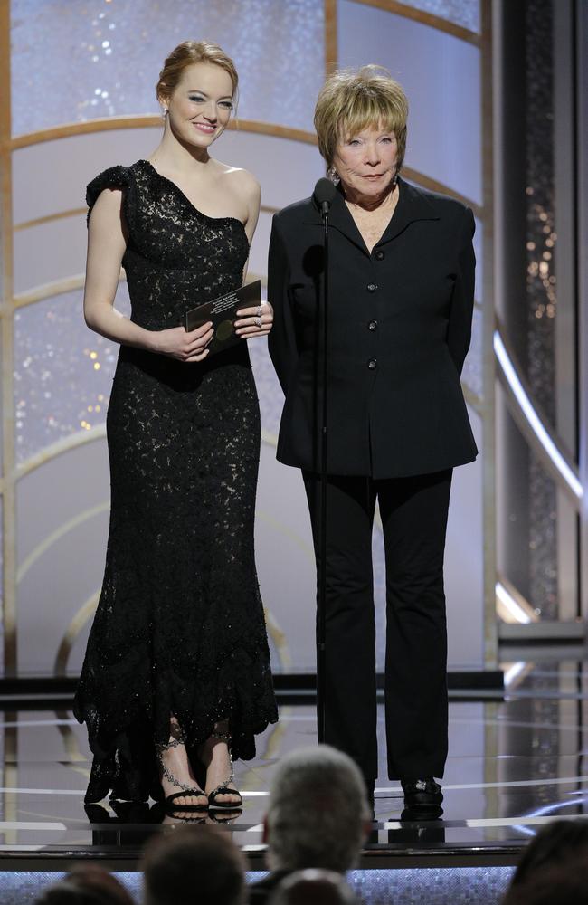 Emma Stone and Shirley MacLaine speak onstage during the 75th Annual Golden Globe Awards at The Beverly Hilton Hotel on January 7, 2018 in Beverly Hills, California. Picture: Getty