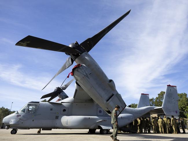 Australian Army soldiers from the 3rd Brigade and partner nations view a United States Marine Corps MV-22 Osprey during the opening ceremony of North Queensland Warfighter Exercise held at Lavarack Barracks, Townsville, Queensland. PHOTO: PTE Jessica Gray