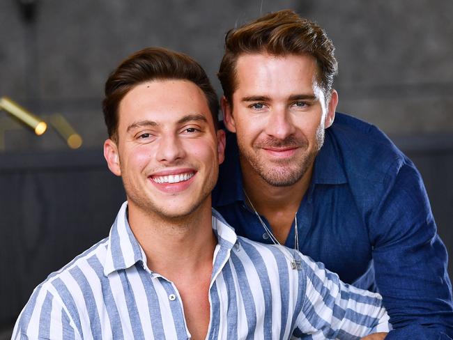 Hugh Sheridan with his partner  Kurt Roberts who were engaged last night pose in their North Adelaide hotel .Saturday March,6,2021.Picture Mark Brake