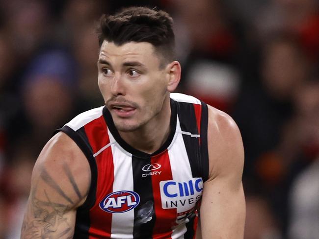 MELBOURNE, AUSTRALIA - JULY 27:  Josh Battle of the Saints runs with the ball during the round 20 AFL match between St Kilda Saints and Essendon Bombers at Marvel Stadium, on July 27, 2024, in Melbourne, Australia. (Photo by Darrian Traynor/Getty Images)