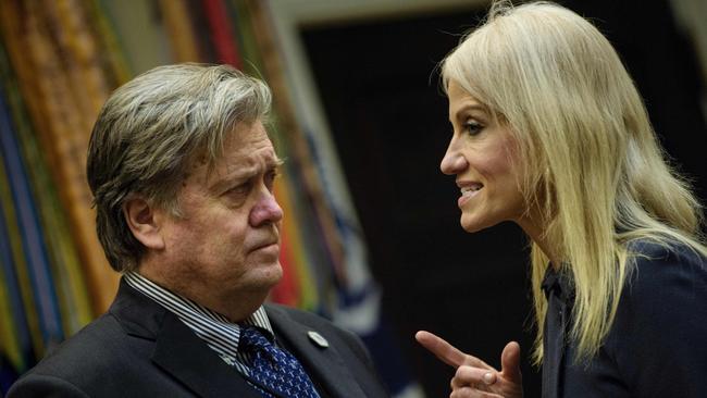 Trump chief strategist Steve Bannon and Counselor to US President Donald Trump, Kellyanne Conway, talk before a meeting on cyber security in the White House. (Pic: AFP Photo/Brendan Smialowski)