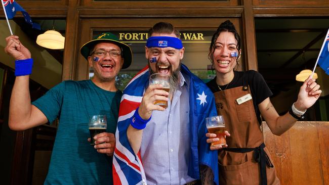 Tommy Slatter, Neil Jones and Judy Chute will celebrate Australia Day at the Fortune of War pub in The Rocks. Picture: Justin Lloyd.