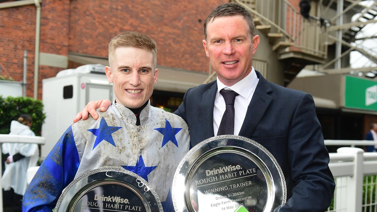 Trainer Andrew Scott (right) with jockey Sam Weatherley after winning the Rough Habit Plate with Dark Destroyer. Picture: Grant Peters-Trackside Photography