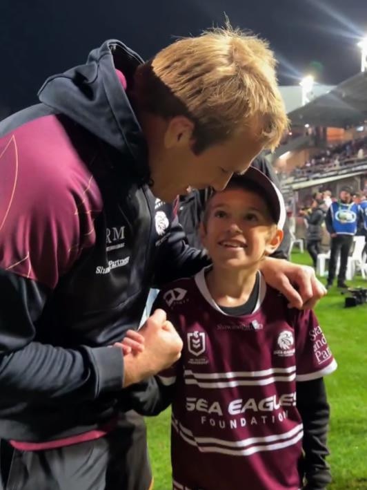 Jake Trbojevic and the young Manly fan. Picture: Sea Eagles
