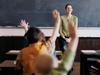 NEWS: Generic pic of a teacher standing at the blackboard while talking to students in a classroom.