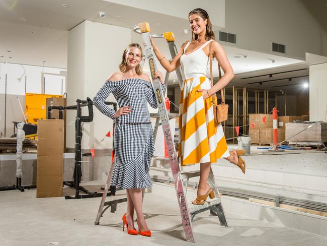 Models Chelsea Scanlon and Anna McEvoy at the construction site of Melbourne’s Debenhams store before it opened in 2017. Picture: Eugene Hyland