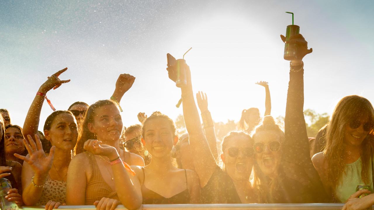 Front row punters under a shower from the hose at BASSINTHEGRASS 2021. Picture: Che Chorley