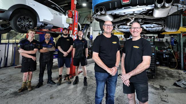 Hunter Automotive have been named Far North Queensland’s best mechanics, as voted by Cairns Post readers. Hunter Automotive employees Joel Mundie, Wayne Quinnell, Jarod Squair and Corey Downie with business owners Glenn Hunter and Cliff Hunter in their Bungalow workshop. Picture: Brendan Radke