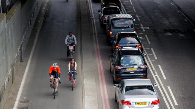 Bike riders using a cycle superhighway in Upper Thames St, London. Picture: iStock