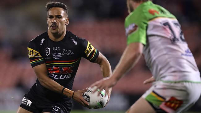 SYDNEY, AUSTRALIA - AUGUST 08:  Daine Laurie of the Panthers looks to offload the ball during the round 13 NRL match between the Penrith Panthers and the Canberra Raiders at Panthers Stadium on August 08, 2020 in Sydney, Australia. (Photo by Mark Kolbe/Getty Images)