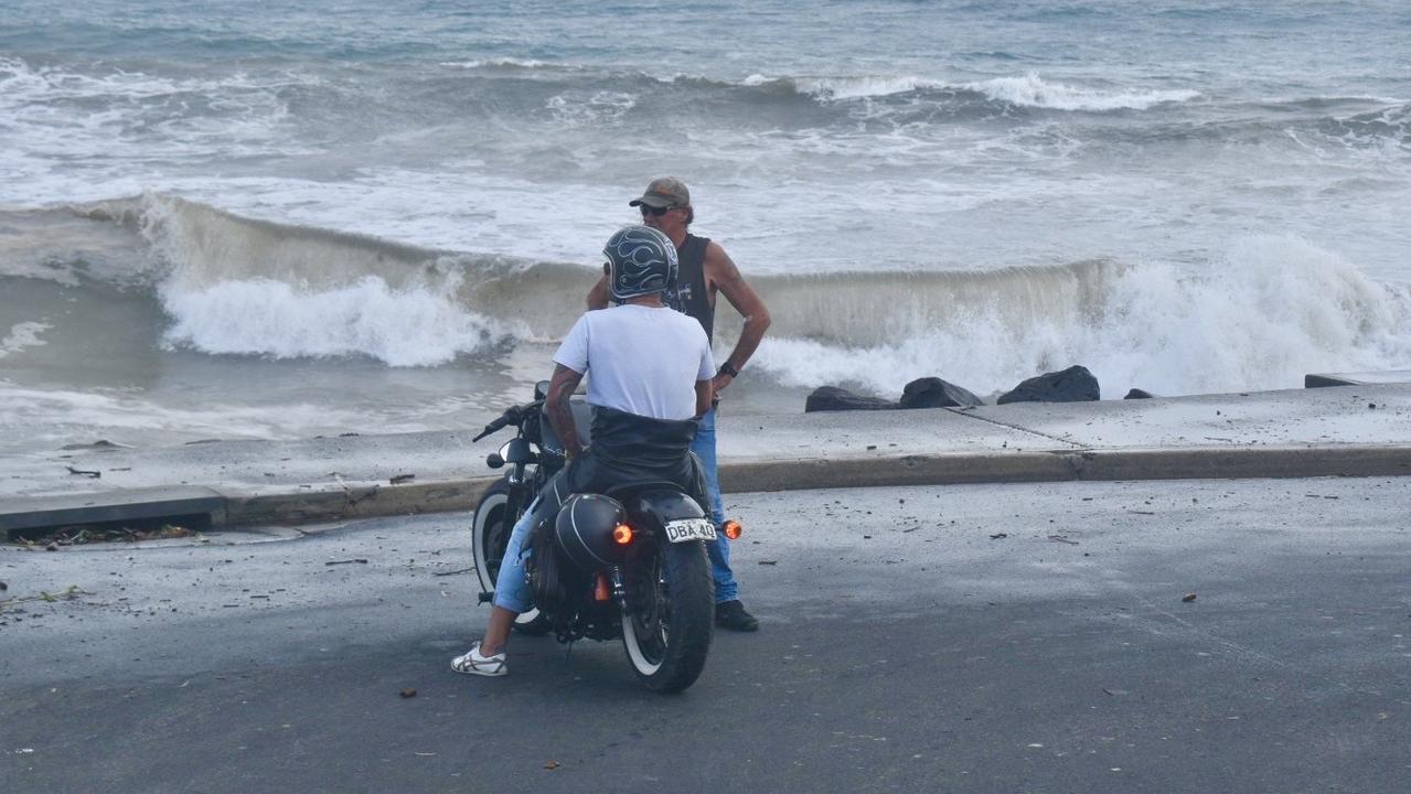 Main beach in Byron Bay remained closed but many visitors and residents decided to go and check out the high tide on Tuesday morning.