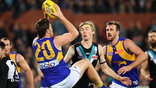 West Coast’s Jeremy McGovern outmarks Port Adelaide teenager Todd Marshall during the Eagles’ extra-time elimination final win. Picture: Daniel Kalisz (Getty Images).