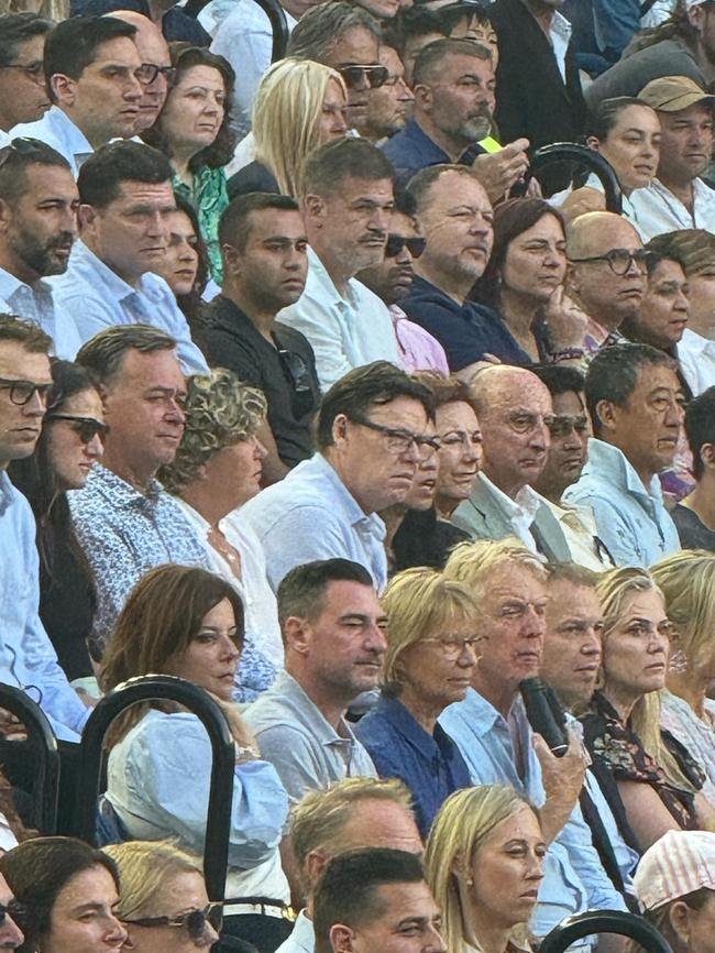 Star Entertainment chief Steve McCann, centre, at the Australian Open.