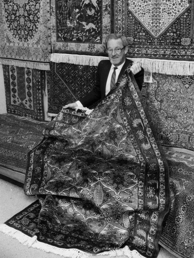 John Browne with a selection of rug stock at the Miller Anderson department store in March 1988.