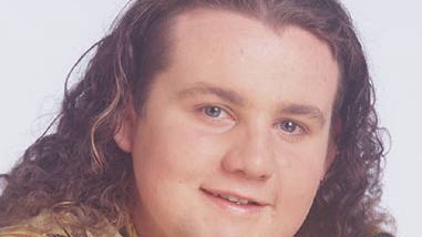 A young Ryan Moloney and the hair that launched his acting career. Picture: Supplied