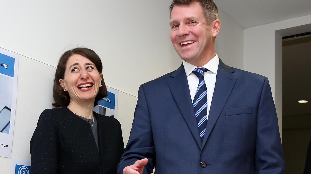 Mike Baird and Gladys Berejiklian pictured in 2016 when he was premier and she treasurer. Picture: Richard Dobson