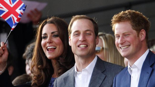 Catherine and Princes William and Harry at the Diamond Jubilee Concert outside Buckingham Palace in 2011. Picture: AFP