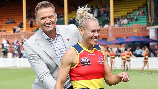 Mark Soderstrom congratulates his radio partner and Crows player Erin Phillips after her win in the 2021 AFLW Round 9 match against Collingwood on Sunday. Picture: Sarah Reed/AFL Photos via Getty