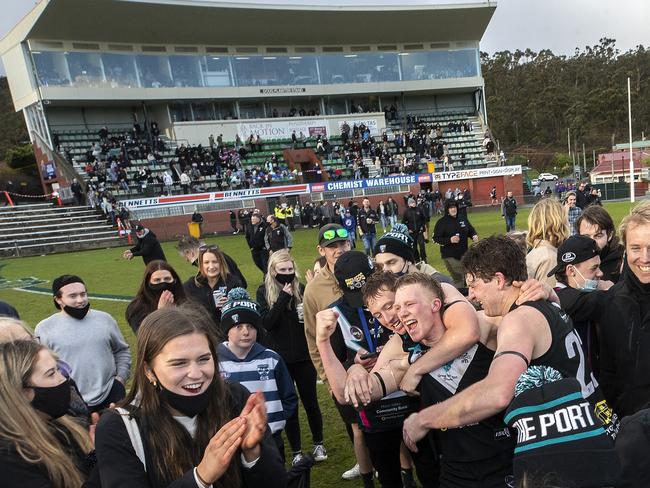 Cygnet fans streamed onto the ground to celebrate the win. Picture: Chris Kidd