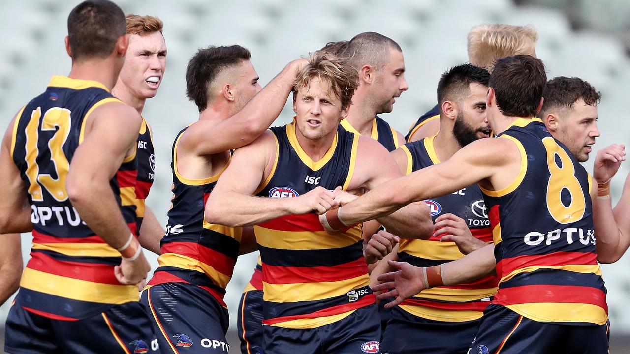 Rory Sloane with his Adelaide teammates. Photo: Sarah Reed