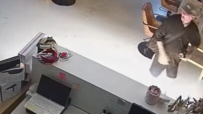 Screen capture of store CCTV footage released by Mackay Police over a break-in at a shop on Sydney St, Mackay, on December 21, 2022