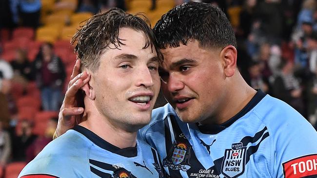 BRISBANE, AUSTRALIA - JUNE 27: Cameron Murray of the Blues and Latrell Mitchell of the Blues celebrate after winning game two of the 2021 State of Origin series between the Queensland Maroons and the New South Wales Blues at Suncorp Stadium on June 27, 2021 in Brisbane, Australia. (Photo by Bradley Kanaris/Getty Images)