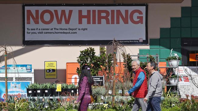 Home Depot customers walk by a posted now hiring sign in San Rafael, California. Picture: Justin Sullivan/AFP