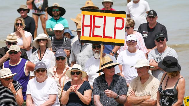 MELBOURNE, AUSTRALIA - JANUARY 5 2025Beach goers and locals attend a rally at Inverloch Surf Life Saving Club where sand is rapidly eroding from the beach (they've apparently lost about 70m of beach already). The state government was supposed to release a report late last year determining their plans for the beach, but held it (expected to drop in January now). the government is seriously considering letting the surf beach and the facility just be washed away instead of intervening. Picture: Brendan Beckett