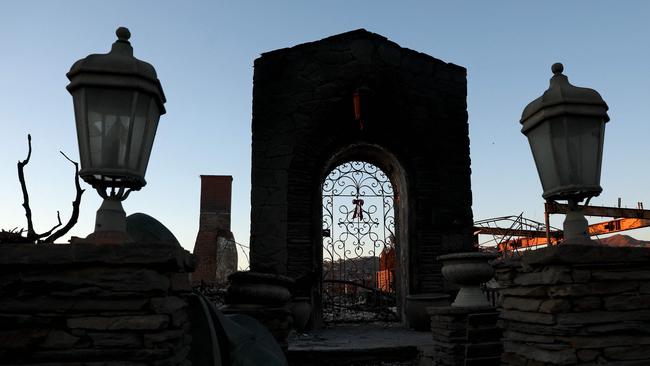 A doorway and porch lights remain at a home destroyed in the Palisades Fire on January 12, 2025 in Pacific Palisades, California. Picture: Getty Images via AFP