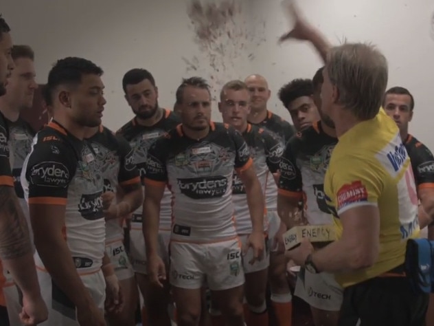 West Tigers trainer Ronnie Palmer sprinkles 'energy dust' on players before a game. Picture: YouTube/Tiger Town